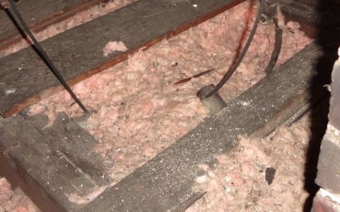 knob and tube buried in insulation